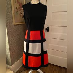 An Amazing Rare Vintage Dress By Kay Windsor- Black, Deep Orange Or Tomato Red And White Color Block Fabric And Size Tag Missing/ Feels Like A Wool Polyester Blend Possibly- Mid Weight 28” Waist 36” Bust 15.5” Shoulder To Waist 24.5” Waist To Hem 40” Total Length 36” Hips Fits Like A Modern Medium, And Around Or Below Knee Length Depending On Your Height- Please Refer To Measurements A Bit Of Stretch To The Fabric Fantastic Gently Used Vintage Condition, No Holes, Stains, Rips, Etc Space Age Dress, Deep Orange, Windsor Dresses, Mod Dress, Retro Color, Space Age, Dress Sleeveless, Vintage Dress, Size Tag