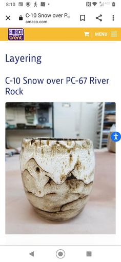 a white bowl sitting on top of a wooden table