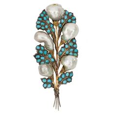 From Doyle | Silver, Gold, Gray Baroque Freshwater Pearl and Turquoise Clip-Brooch, Buccellati. 18 kt., the stylized bouquet composed of flared leaves set throughout with oval cabochon turquoises, accented by 5 gray baroque pearls approximately 14.0 to 9.0 mm., signed Buccellati, Italy, approximately 14.4 dwt. | Turquoise Brooch, Gold Spray, Diamond Jewel, Irene Neuwirth, Jewelry Auction