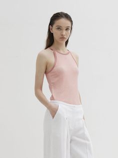 Editor's NotesThe Express Tank Top is a sleeveless ribbed top that you can wear daily with a soft touch.- Tencel blended material- Sleeveless- Slim silhouette- Ribbed structure Measurements(in.)Size: OneSize(XS-M)- Total Length:21.25in.- Neck: 7.87in.- Chest: 13.38in.- Hem: 13.38in. Model Info:(Katerina) Height 5' 74, Wearing a size One               Composition &Care- Fabric: 81% Tencel, 10% Span, 9% Wool- Dry CleanRecommended- Hand Wash at 30Degrees- Use LiquidNeutral Detergent Designer- by Theballon Pink Ribbed Cami Tank Top, Feminine Spring Seamless Tank Top, Chic Pink Ribbed Tank Top, Pink Ribbed Cami Top, Spring Ribbed Tank Camisole, Spring Ribbed Cami Tank Top, Chic Pink Ribbed Knit Top, Summer Sleeveless Tank Top With Ribbed Neckline, Chic Summer Tank Top With Ribbed Neckline