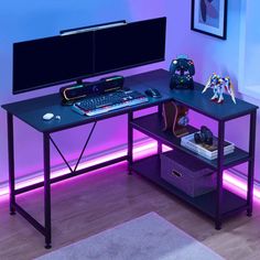 a computer desk with a keyboard and mouse on it in front of a purple wall