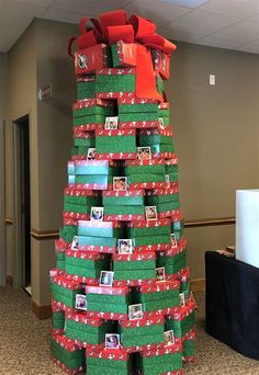 a very large christmas tree made out of boxes