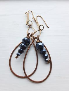 Handmade jewelry, copper wire wrapped earrings, bracelets, and necklaces, semi-precious gemstones and glass beads, unique design. ~Unique Design~ Each piece is designed and handcrafted by me. All of these unique styles are made to order especially for you. ~Who is this jewelry great for?~ An elegant, boho, classic style. You can wear it for a casual day or a dressed-up night on the town. This jewelry is a perfect gift for your mother, sister, girlfriend, wife, daughter or anyone who loves beautiful handmade jewelry. ~Materials~ Your handcrafted jewelry is made with various shades of copper or stainless steel wire. These wires are hypoallergenic for most people. They may tarnish over time if exposed to water. The beads used are semi-precious stones, glass, or ceramic.  ~Gifts~ Each order co Bronze Wire Wrapped Drop Earrings, Wire Wrapped Czech Glass Drop Earrings, Wire Wrapped Teardrop Copper Jewelry, Copper Teardrop Wire Wrapped Jewelry, Adjustable Teardrop Wire Jewelry, Wire Wrapped Copper Drop Earrings, Black Czech Glass Jewelry With Ear Wire, Teardrop Czech Glass Wire Wrapped Jewelry, Copper Wire Dangle Jewelry For Jewelry Making