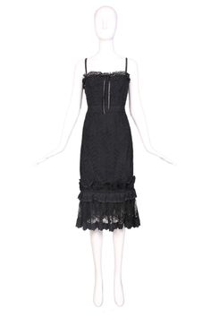 For Sale on 1stDibs - Dolce & Gabbana black eyelet lace underwire bustier dress with adjustable straps and clasp in the back. Satin ribbon bow at top and lace & eyelet Elegant Fitted Corset Dress With Bow Straps, Elegant Lace Corset Dress With Spaghetti Straps, Elegant Corset Dress With Ruffled Straps, Elegant Cocktail Corset Dress With Adjustable Straps, Spaghetti Straps Lace Dress For Cocktail, Cocktail Lace Dress With Spaghetti Straps, Elegant Lace Corset Dress With Straps, Sleeveless Lace Dress With Bow Straps, Lace Dress With Adjustable Straps In Coquette Style