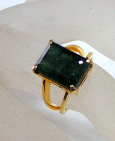 Vintage 18 K solid gold ring set with Natural Large Emerald. One of type collection piece in very good condition. USA ring size -7 ( we can adjust size), Size of Emerald-13.5/9.5 mm, weight-6.250 grams, material-18 K gold and natural Emerald. Gold Emerald Signet Ring Gift, Gold Rings Emerald Cut For Gift, Gold Emerald Open Ring With Polished Finish, Gold Solitaire Emerald Ring For Formal Occasions, Emerald Cut Gold Rings For Gift, Rectangular Emerald Ring With Polished Gold Finish, Gold Emerald Ring Untreated For Gift, Gold Rectangular Sapphire Promise Ring, Gold Open Emerald Ring For Formal Occasions