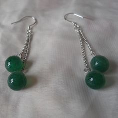 Welcome back to my shop: https://www.etsy.com/shop/pearlandjewelry I make them with 8mm natural green jadeite and sterling silver hook It is nice for your wedding. If you need the other lengh or size ,Please feel free contact me.Thank you so much, :) Green Jade Earrings For Wedding, Jade Beaded Dangle Earrings For Gift, Jade Earrings With Dangling Beads As A Gift, Green Jade Jewelry With Dangling Beads, Elegant Aventurine Dangle Earrings, Adjustable Jade Beaded Dangle Earrings, Green Aventurine Drop Earrings, Green Aventurine Dangle Earrings, Silver Jade Dangle Earrings