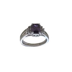 Elevate your style with our Amethyst CZ Sparkle Ring, meticulously crafted in silver and adorned with a stunning amethyst CZ stone for a luxurious and vibrant appearance. The ring also features unique 5A lab-created diamonds by CZ, adding to its high-quality and real diamond feel. Finished with 18kt gold plating and a highly-reflective rhodium polish, this ring not only dazzles but also ensures durability and prevents tarnishing. Finish: White Gold Plating Material: Silver, Alloy, CZ Stones, Ame Luxury Amethyst Ring In Sterling Silver, Luxury Sterling Silver Amethyst Ring With Gemstone Accents, Luxury Polished Amethyst Ring, Silver Luxury Amethyst Ring With Polished Finish, Luxury Purple Crystal Ring In Sterling Silver, Sparkling Rings, Amethyst Color, Cz Ring, Lab Created Diamonds