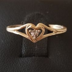 Dainty 10k Gold Heart Ring Metal- Solid Gold Color Gold- Yellow Gold Stone- Diamond Stone Size- Too Small To Measure Accuratley Approx. Size- 5 3/4 - 6 ( See Photos) Stamped/Makers Markings- 10k Aporox. Weigth- 1.03grams Conditions Used/Vintage, Has Regular Wear As It's A Vintage Ring Fem Style, Stamp Maker, Dainty Rings, 10k Gold Ring, Gold Heart Ring, Vintage Jewellery Rings, Gold Stone, Ring Metal, Dainty Ring