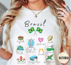 Show your love for Brasil in this ultra cute souvenir tee ♡  (fiber content may vary for different colors) ♡ Athletic Heather is 90% cotton, 10% polyester ♡ Solid black & Heather colors are 52% cotton and 48% polyester ♡ Light fabric (4.2 oz/yd² (142 g/m ♡ Retail fit ♡ Tear away label ♡ Runs true to size --------------------------------------------- Garment features: ♡ With side seams - located along the sides, they help hold the garment's shape longer and give it structural support ♡ Ribbed kni Brazil T Shirt, Brazil Shirt, Noir Uni, Flag Shirt, Twill Tape, Rio De Janeiro, Solid Black, Light Fabric, Ribbed Knit