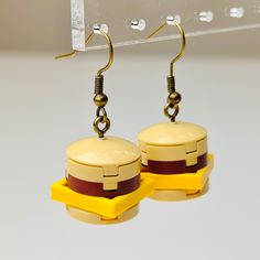 Show your love of the culinary perfection that is they cheeseburger. These earrings are handmade with 100% real Lego® and are built from new parts. Approx 1.5" in size from ear. Diy Lego Earrings, Wacky Earrings, Lego Bracelet, Lego Crafts, Lego Earrings, Lego Lighting, Elementary Stem, Lego Jewelry, Harry Potter Lego Sets