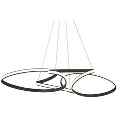 a modern chandelier with three circular lights hanging from it's center point