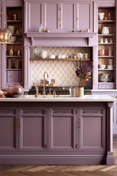 a kitchen with purple cabinets and white counter tops