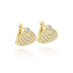 Handcrafted in 18k Yellow Gold and White Diamonds White Diamond Pave Huggie Earrings You may also like our Veni Diamant 18k Medium Hoops. Luxury Clip-on Huggie Earrings For Formal Occasions, Luxury Pave Setting Earrings For Formal Events, Luxury Pave Set Earrings For Formal Occasions, Elegant Yellow Gold Clip-on Diamond Earrings, Luxury Diamond Huggie Earrings For Formal Occasions, Luxury Formal Huggie Earrings With Diamond Accents, Exquisite Earrings With Pave Setting For Evening, Formal Yellow Gold Huggie Earrings With Pave Setting, Yellow Gold Diamond Cut Earrings For Evening