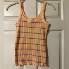 Questions? Leave A Comment Below! Y2k Style Ribbed Tank Top For Summer, Pink Ribbed Tank Top For Summer, Pink Ribbed Tank Top For Spring, Pink Casual Tank Top For Spring, Casual Pink Tank Top For Spring, Trendy Peach Spring Tank Top, Casual Orange Tank Top For Spring, Fitted Casual Peach Tank Top, Casual Fitted Peach Tank Top