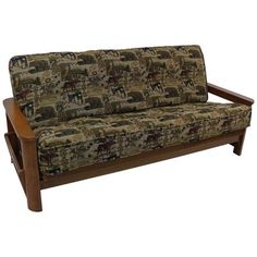 a wooden frame couch with an animal print upholstered on the back and arms