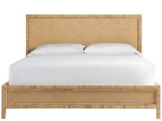 a bed with white sheets and pillows on top of it's headboard, in front of a white background