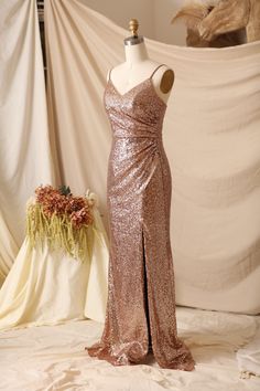 Elevate your evening look with this stunning sequin dress, perfect for bridesmaids or any special occasion. The Mora dress features a rose gold color that will add a touch of glam to your wardrobe. But wait, there's more - this dress can also be made in 10 different colors to suit your personal style! Color: Rose gold as shown, also can be made in 10 different colors.  Material: 100% Polyester Size: U.S Size 2-Size 26, Free Custom  Turn-Around Time: 30 days Sequin Dress Bridesmaid, Rose Gold Sequin Bridesmaid Dress, Gold Sequin Bridesmaid Dress, Rose Gold Prom Dress, Sequin Bridesmaid Dress, Rose Gold Dress, Sequin Bridesmaid, Gold Prom Dresses, Sequin Bridesmaid Dresses