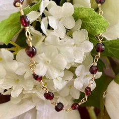 Beautifully faceted garnet coin beads necklace. Can be worn as is or with pendants. Length 16" Extender 2.75" Garnet properties is a stone of prosperity and abundance, encouraging gratitude and service to others. It is a deeply spiritual stone also known as the stone of good luck and health. It can help get rid of the negative energies and transform them to positive ones. It's a good gemstone for purification and detoxification. -This information is intended for spiritual support only- Beads 4mm Adjustable Gemstone Beads Jewelry For Blessing, Garnet Necklaces With Faceted Beads For Gifts, Adjustable Spiritual Garnet Jewelry, Amber Jewelry With Faceted Beads For Gift, Handmade Burgundy Necklaces With Round Beads, Spiritual Birthstone Necklaces With Round Beads, Healing Birthstone Necklaces With Round Beads, Healing Birthstone Necklace With Round Beads, Handmade Garnet Bead Necklaces