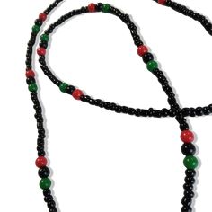 These Marcus Garvey Beaded Necklaces perfectly embody the spirit of Pan-African pride with vibrant red, black, and green beads and a captivating pendant of Marcus Garvey. Show your passion for this powerful movement with this stunning RBG necklace. Bead Style changes periodically (may not be same as pictured) Pendants are Acrylic Necklace length from end to end is 24" Pendants are 2" high x 1.25" wide Solid Black on Back Great for Gifts ORDERS USUALLY SHIP IN 24 HOURS GNE-01 GNE-02 When ordering Black Hand-strung Beaded Necklaces For Festivals, Festival Black Hand-strung Beaded Necklaces, Black Hand-strung Beaded Necklace For Festivals, Hand-strung Black Beaded Necklaces For Festivals, Festival Hand-strung Black Beaded Necklaces, Black Beaded Necklaces With Colorful Beads For Spiritual Use, Adjustable Red And Black Beaded Necklace, Adjustable Red Necklace With Black Beads, Adjustable Red Beaded Necklace With Black Beads