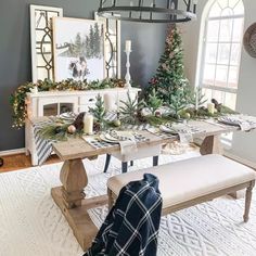 the dining room table is decorated for christmas