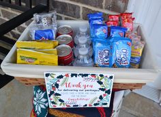 a picnic basket filled with snacks and drinks