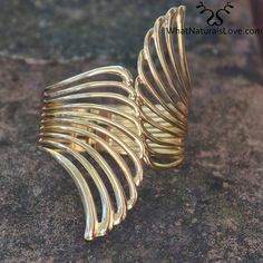 Hair Cuff Golden Wings for Locs, Sisterlocks, Dreadlocks and Braids – WhatNaturalsLove.com Thick Locs, Hair Cuff, Hair Thickness, Best Hair Care Products, Golden Wings, Hair Cuffs, Loc Jewelry, Afrikaanse Mode, Sisterlocks