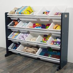 a shelf with bins and toys on it