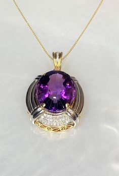 Amethyst Diamond Pendant, Vintage Amethyst Pendant, Amethyst Diamond Necklace, One of a Kind Amethyst , 60 carats, Amethyst Jewelry, OOAK The perfect accessory for your neckline! Make a statement with this retro two tone 18k gold pendant which may be converted into a pearl enhancer. Featuring an exceptional extra large amethyst weighing 61.06 carats accented by 1.20 carats of sparkling white diamonds. *Measurements: Length from bail: 2 3/8'' Length from top of pendant: 1 1/2'' Width: 1 3/8'' Hei Luxury Amethyst Necklace With Diamond Accents, Luxury Purple Amethyst Gemstones, Purple Amethyst Necklace With Diamond Accents, Purple Amethyst Gemstones With Diamond Accents, Purple Necklaces With Accent Stones For Formal Occasions, Dainty Earrings Studs, Antique Emerald Ring, Jewelry 2024, Purple Stone Rings