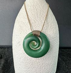 This very popular koru pendant is hand carved from Canadian Nephrite Jade, it measures approximately 35mm and comes with a fully adjustable cord. All of our Jade is 100% natural. The Koru symbolizes new life, growth, strength and peace. View other products from JademineCanada here: https://www.etsy.com/ca/shop/JadeMineCanada?ref=hdr_shop_menu ** All purchases from outside of Canada are subject to duties and VAT fee's ------ Jade West has been mining Canadian Nephrite Jade for 40 years.  Jade Wes Jade West, Hawaiian Culture, Special Necklace, Wooden Gift Boxes, Nephrite Jade, Jade Necklace, Natural Jade, Wooden Gifts, Jade Pendant