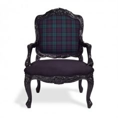 a black and blue chair with plaid upholstered on the back, sitting against a white background