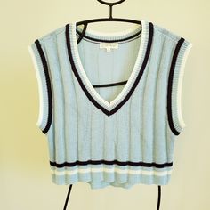 Super Cute Sweater Vest. Great Over A T-Shirt, Button Down, Or Turtleneck! Feels Almost Silky. 100% Acrylic. About 18 1/2" From Armpit To Armpit. About 17" From Shoulder To Front Hem Bottom. Preppy Fitted V-neck Top, Preppy Blue V-neck Top, Blue V-neck Preppy Tops, Preppy V-neck Tops For Spring, Cute Sweater Vest, Crop Sweater Vest, Cute Sweater, Crop Sweater, Cute Sweaters