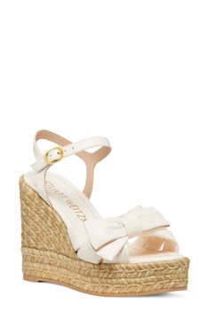 A soft leather bow sweetens a beachy ankle-strap sandal lifted by a jute-wrapped platform and integrated wedge heel. 3 3/4" heel; 1" platform Adjustable ankle strap with buckle closure Leather upper/synthetic lining/synthetic sole Made in Spain Shoe Wedges, Heeled Wedges, Sandle Heels, Heeled Platform Sandals, Cute Summer Heels, Wedged Heel Sandals, White Wedges Shoes, Wedges Aesthetic, Wedges Sandals