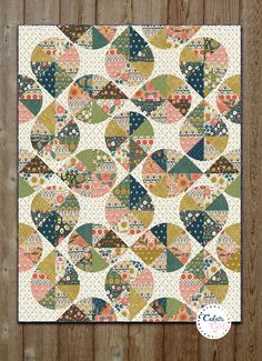 an image of a quilt pattern on a wooden background with the words, love is in the air