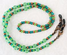 Green Brown Beaded Eyeglass Chain - Juicybeads Jewelry Adjustable Green Necklace For Everyday Use, Everyday Adjustable Green Necklace, Adjustable Czech Glass Beaded Necklaces With Lobster Clasp, Adjustable Green Czech Glass Beaded Necklaces, Adjustable Round Beaded Necklaces For Everyday, Everyday Round Beaded Necklaces With Lobster Clasp, Adjustable Colorful Beaded Jewelry For Everyday Use, Adjustable Beaded Chain Necklace For Everyday, Adjustable Round Bead Glass Necklaces