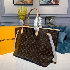 Louis vuitton Neverfull GM Tote Bag Monogram Canvas Beige For Women, Women’s Handbag, Shoulder Bags 15.7in/39cm LV M40990 Rep 1:1 The Neverfull GM tote unites timeless design with heritage details. Made from supple Monogram canvas with natural trim, it is ultra-roomy but never bulky, with side laces that cinch for a sleek allure or loosen for a more casual look. Slim, comfortable handles slip easily over the shoulder or arm. Lined in colourful textile, it features a removable pouch that ca Gucci Bags Handbags, Baby Tote Bag, Lv Neverfull, Louis Vuitton Neverfull Gm, Colorful Textiles, Neverfull Gm, Etsy Seo, Vuitton Neverfull, Evening Clutch Bag