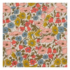 an image of a flowery pattern with many different colors and sizes on the fabric