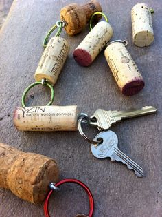 wine corks and keys are laying on the ground