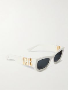 It's hard to beat the sartorial impact of a pair of statement sunglasses. Miu Miu's playfully named 'Glimpse' style take cues from old Hollywood, characterized by bold, oversized square frames. They're fitted with smoked UV-protective lenses and feature the label's moniker at the temples. Miu Miu Eyewear, Statement Sunglasses, Miu Miu Sunglasses, Sunglasses White, White Accessories, Butterfly Sunglasses, Acetate Sunglasses, Tinted Sunglasses, Eyewear Womens