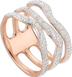 a rose gold ring with white diamonds on it's sides and in the center