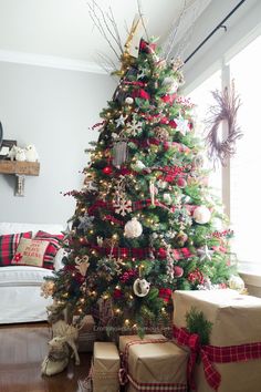 a decorated christmas tree in a living room