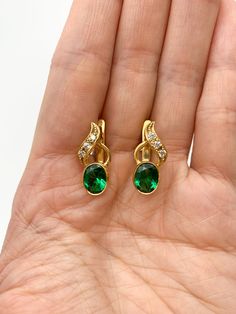 Vintage Emerald Earrings set with a Created Emerald in a flawless clarity & stunning green color, at 8x6mm each (4 Cts a pair). Gold Vermeil: 18k Gold over Solid 925 Sterling Silver ☞ made to last. Matching Pendant: www.etsy.com/listing/1688369504 Matching Ring: www.etsy.com/listing/1688363556 For Pierced Ears - has a pin that goes into the ear and a leaver that securely closes on the pin behind the earlobes - " English Lock " Details :  ♥ Each item comes in a cute GIFT BOX ✓ ♥ GUARANTEE on the Green Oval Clip-on Earrings, Oval Green Clip-on Earrings, Oval Crystal Earrings For Formal Occasions, Oval May Birthstone Earrings, Elegant Green Oval Clip-on Earrings, Oval Clip-on Earrings For Gift, Oval Earrings For Anniversary, Oval Clip-on Earrings For Anniversary, Vintage Emerald Earrings