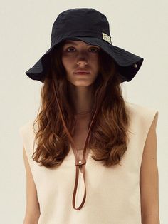 Marchen is a heritage mood fashion brand that not only stimulates the nostalgia of the older generation but also satisfies the new sensibilities of all generations by re-inventing the romantic design that the main characters in fairy tales would wear with a modern sensibility.- Trendy safari designed bucket hat- Classic and vintage mood leather strap detail- Breathable mesh lining gives lightweight and cool feel- You can create your own shape with built-in wire Safari Hat Outfit, Safari Style Bucket Hat For Beach, Vintage Adjustable Wide Brim Bucket Hat, Summer Safari Style Travel Hat, Spring Safari Beach Hat, Adjustable Safari Style Bucket Hat, Vintage Adjustable Bucket Hat With Flat Brim, Vintage Wide Brim Adjustable Bucket Hat, Natural Brimmed Safari Hat