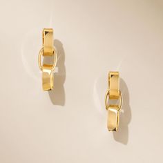 Discover effortless elegance with our Luna Link Earrings. Made from sterling silver and finished with 14K gold plating, these refined drops bring a touch of modern sophistication to any outfit. Versatile and chic, they are perfect for both daily wear and special moments. Product Details: Made from 14K gold plated .925 sterling silver Measures approximately 0.75" total length Post & Friction Triple Oval Link Drop Earring AL200130V Made in Italy Elegant 14k Yellow Gold Linear Earrings, Formal Yellow Gold Plated Linear Earrings, Elegant Linear Drop Earrings With Polished Finish, Chic Formal Earrings With Polished Finish, Elegant 14k Gold Linear Earrings With Polished Finish, Chic Linear Earrings For Formal Occasions, Elegant Yellow Gold Linear Earrings In Sterling Silver, Elegant Yellow Gold Sterling Silver Linear Earrings, Chic Polished Formal Earrings