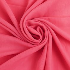 a close up view of the fabric on a pink shirting material that is very soft