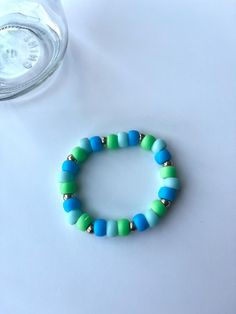 a simple pony bead bracelet Pony Bead Bracelets, Kandi Inspo, Kids Bracelets, Pony Beads, Bead Bracelets, Green And Blue, Bead Bracelet, Halloween Shopping, Beading