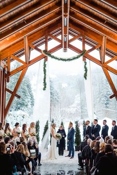 a bride and groom standing at the end of their wedding ceremony