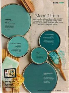 a magazine page with blue paint and wooden utensils on the front, along with text that reads mood lifters