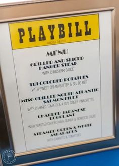 the menu for playbill is displayed in a gold frame