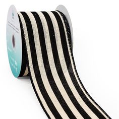 a roll of black and white striped ribbon