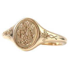 Crafted in 9ct and 18ct gold, the Forget-Me-Not Signet ring is a timeless symbol of love and remembrance. Inspired by Victorian sentimental jewelry, this ring features two letters of your choice, intertwined with delicate Forget-Me-Not flowers, a cherished symbol of enduring affection. The floral design extends down the shank, adding a touch of elegance and sentimentality. At Mayveda, we believe in creating modern heirlooms that tell your story. The Forget-Me-Not Signet is a romantic piece, designed to keep the memory of a loved one close, while also reflecting your personal connection through the engraved letters. The inside of the ring bears the inscription "I love in earnest,” a nod to Victorian devotion, which can be personalized with your own message, making this piece uniquely yours. Small Gold Signet Ring, Victorian Signet Ring, Heirloom Rings Vintage, Vintage Signet Ring, Victorian Rings Engagement, Forget Me Not Jewelry, Signant Ring, Cottagecore Engagement Ring, Ring For Index Finger